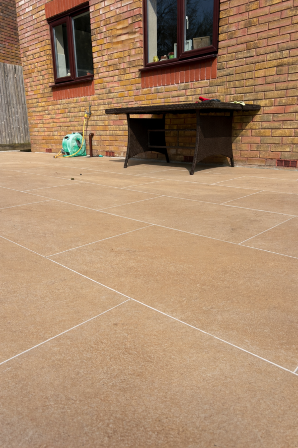 Hammerstone beige porcelain paving using ivory epoxy, grout from PPA