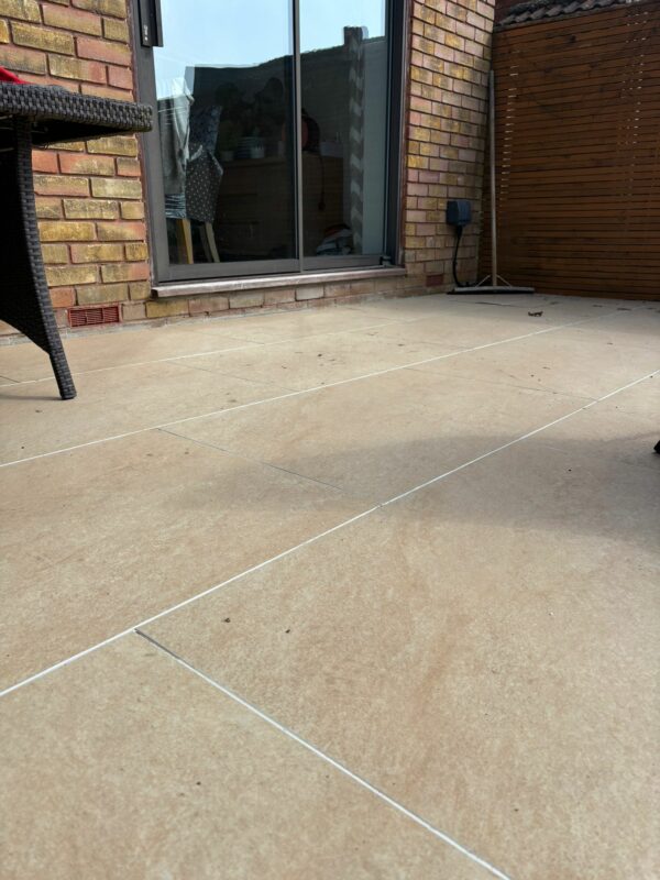 Hammerstone beige porcelain paving using ivory epoxy, grout from PPA
